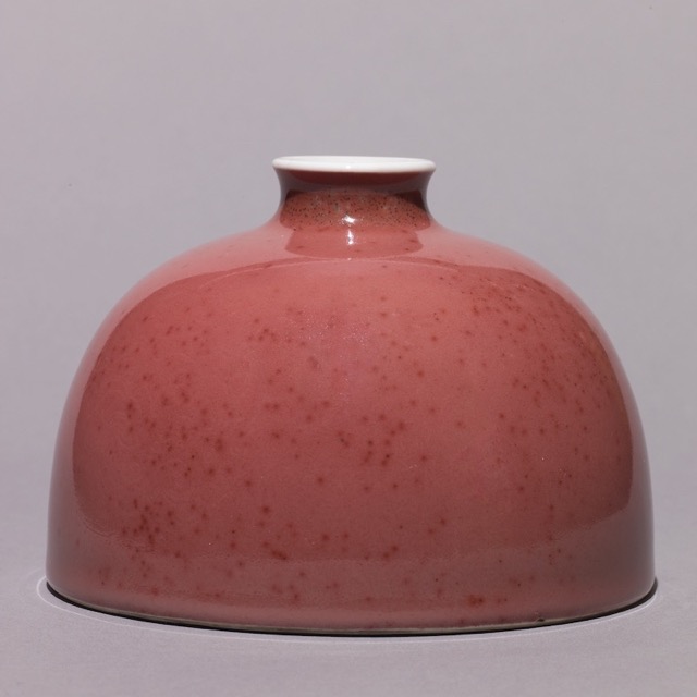 Peach bloom mottled copper red