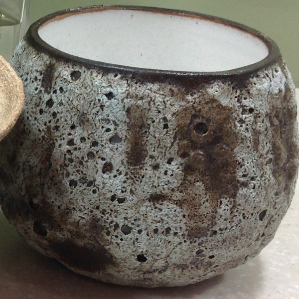 Crater glaze with violent gas-escape pits